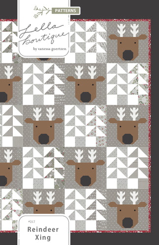Reindeer Xing pieced reindeer quilt by Vanessa Goertzen of Lella Boutique. Fabric is Christmas Eve by Lella Boutique for Moda Fabrics. Make it with fat quarters or scrappy with a Layer Cake.
