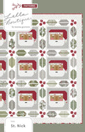 St. Nick Santa quilt by Vanessa Goertzen of Lella Boutique. Traditionally pieced Santa block framed with holly and berry quilt blocks. Make it with a Jelly Roll or Layer Cake. Fabric is Christmas Eve by Lella Boutique for Moda Fabrics.