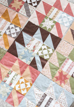 Load image into Gallery viewer, New Leaf scrappy leaf sampler quilt. Layer Cake friendly. Fabric is Folktale by Lella Boutique for Moda Fabrics.