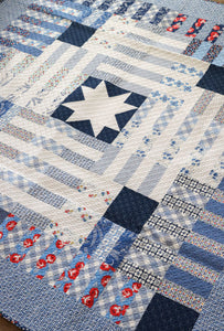 Potluck giant log cabin quilt from the book: Jelly Filled - 18 Quilts from 2-1/2" Strips by Vanessa Goertzen of Lella Boutique. Get your autographed copy of the book here! Lots of great jelly roll strip quilts. Fabric is True Blue Feedsacks by Linzee McCray for Moda Fabrics.