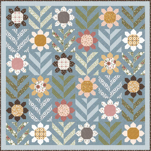 "Spring Fling" geometric flower quilt by Lella Boutique. Fat quarter quilt. Fabric is Folktale by Lella Boutique for Moda Fabrics. Download the PDF here!