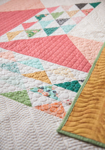 Sugar Cookie giant star quilt by Lella Boutique. Cool traditional star design made with just one charm pack. Fabric is Sugar Pie by Lella Boutique for Moda Fabrics.