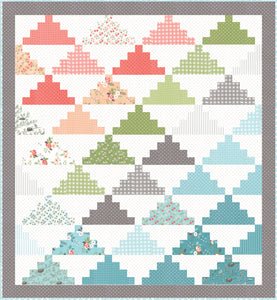 Summit pyramid quilt. Jelly roll quilt made in Nest fabric by Lella Boutique for Moda Fabrics.