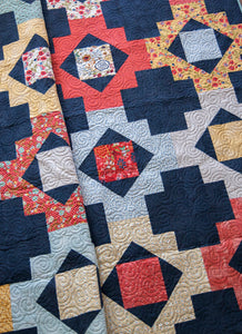 Trinkets boho quilt design by Lella Boutique. Fat quarter friendly. Fabric is Biscuits & Gravy by BasicGrey for Moda Fabrics.. Modern quilt design would make a great boy quilt.