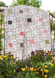 Candy Box - one charm pack quilt. Cool geometric design to showcase one charm pack in a quilt. Fabric is Olive's Flower Market by Lella Boutique for Moda Fabrics.