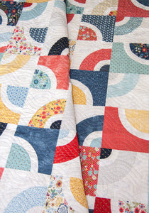 Dishes curved block quilt by Lella Boutique. Layer Cake quilt. Beginner friendly intro to curved piecing. Fabric is Biscuits & Gravy by BasicGrey for Moda Fabrics.
