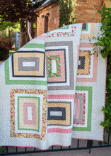 Load image into Gallery viewer, Kith and Kin jelly roll rectangle quilt. Cute farmhouse style quilt.Fabric is Farmer&#39;s Daughter by Lella Boutique for Moda Fabrics.