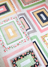 Load image into Gallery viewer, Kith and Kin jelly roll rectangle quilt. Cute farmhouse style quilt.Fabric is Farmer&#39;s Daughter by Lella Boutique for Moda Fabrics.