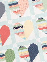 Load image into Gallery viewer, Heartthrob scrappy heart quilt from the book: Jelly Filled - 18 Quilts from 2-1/2&quot; Strips by Vanessa Goertzen of Lella Boutique. Get your autographed copy of the book here! Lots of great jelly roll strip quilts. Fabric is Garden Variety by Lella Boutique for Moda Fabrics.