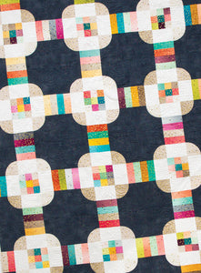Hello Cupcake from the book: Jelly Filled - 18 Quilts from 2-1/2" Strips by Vanessa Goertzen of Lella Boutique. Get your autographed copy of the book here! Lots of great jelly roll strip quilts. Fabric is Ombre Confetti by V & Co for Moda Fabrics.