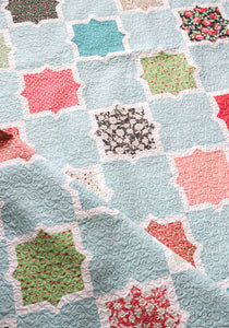 Hubba Hubba tile quilt by Lella Boutique. Layer Cake friendly. Fabric is Bloomington by Lella Boutique for Moda Fabrics.