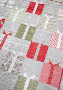 Nice List simple gift quilt by Lella Boutique. Layer Cake quilt. Cute Christmas present quilt blocks are in Christmas Morning fabric by Lella Boutique. 