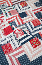 Load image into Gallery viewer, &quot;Fracture&quot; modern log cabin quilt. Fat eighth quilt. Great 4th of July quilt. Fabric is red and navy prints by Bonnie &amp; Camille for Moda. Download the PDF here!