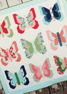 Social Butterfly quilt by Vanessa Goertzen of Lella Boutique. Fat quarter friendly. Fabric is Gooseberry by Lella Boutique for Moda Fabrics.
