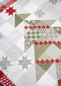 Yule Tree scrappy Christmas tree quilt by Lella Boutique. Fabric is Christmas Morning by Lella Boutique for Moda Fabrics.
